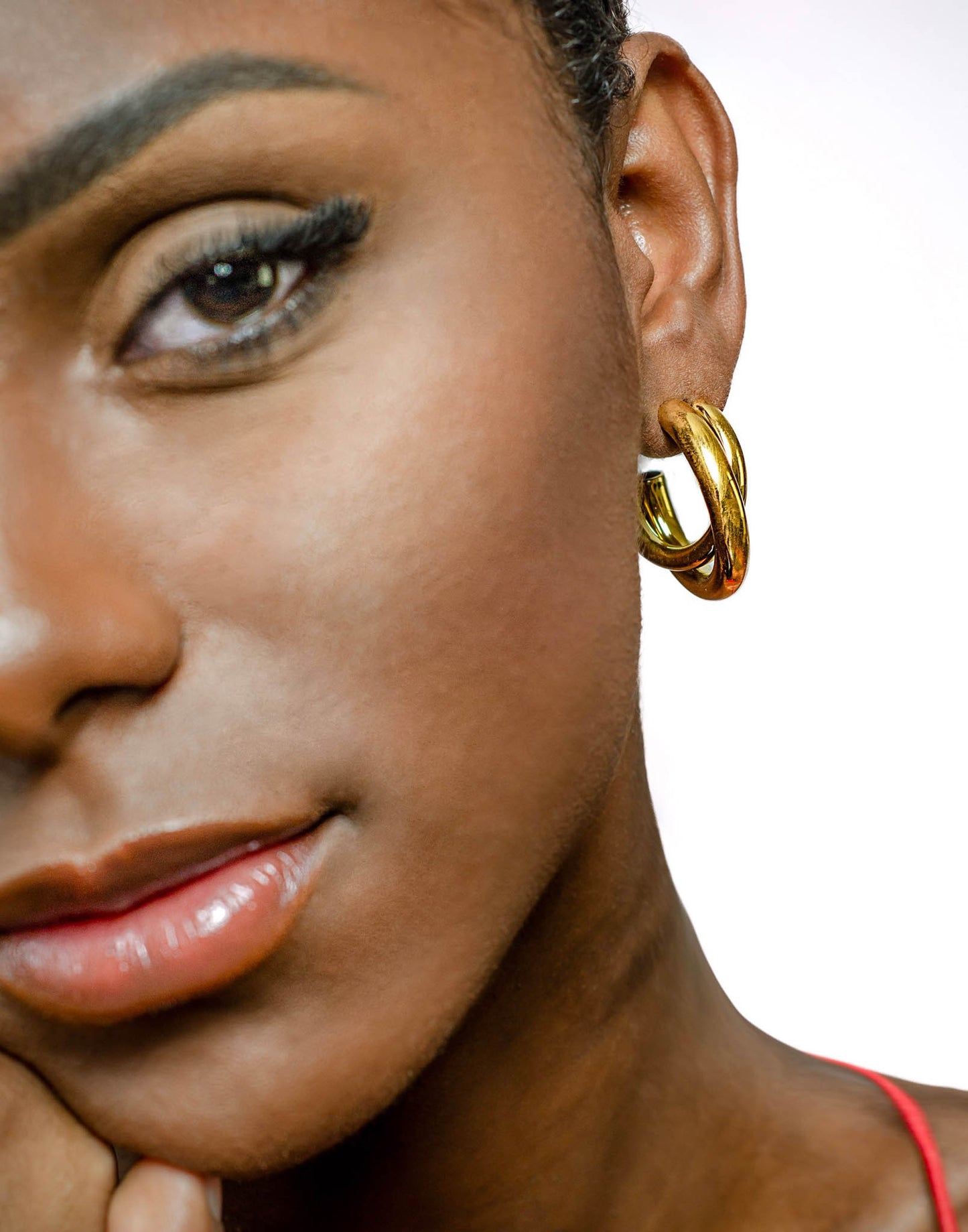 double gold-colored earring