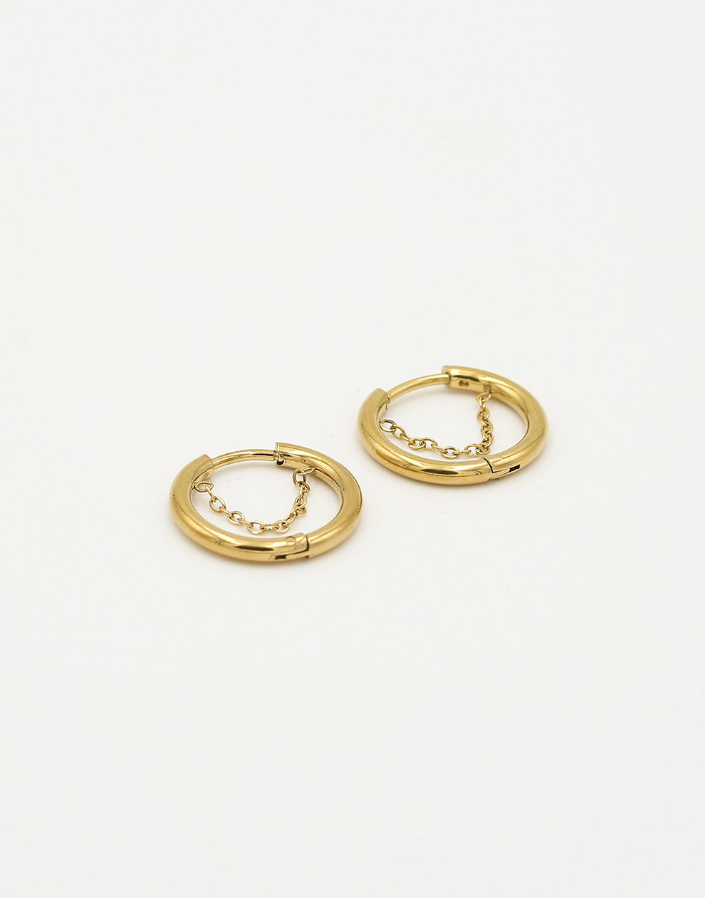 Gold-colored hoop earrings