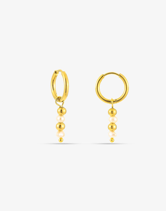 gold-colored ball and pearl earrings