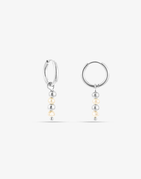 silver-colored ball and pearl earrings