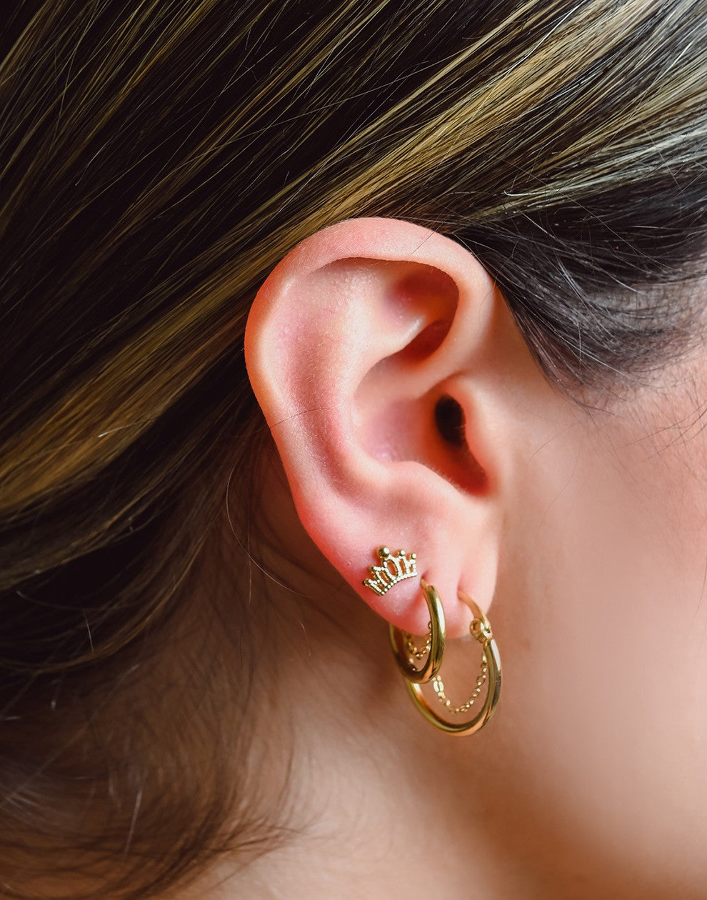 Gold-colored hoop earrings