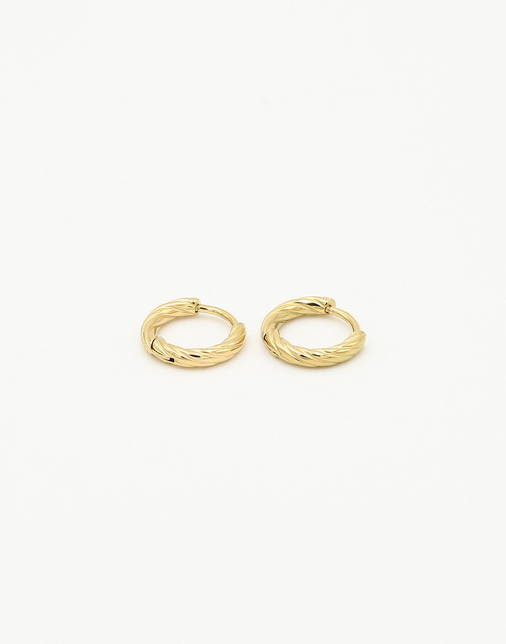 gold-colored twisted hoop earrings
