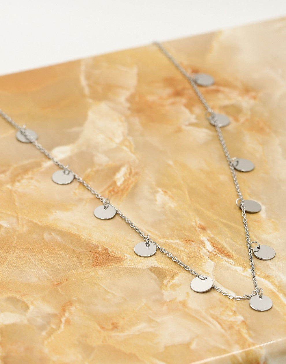 Fijne ketting met muntjes 7mm in zilverkleurig