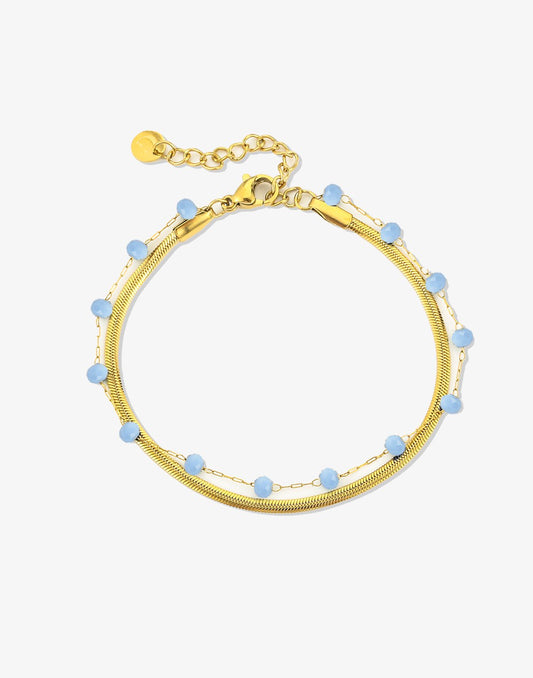 Dubbele armband goudkleurig lila