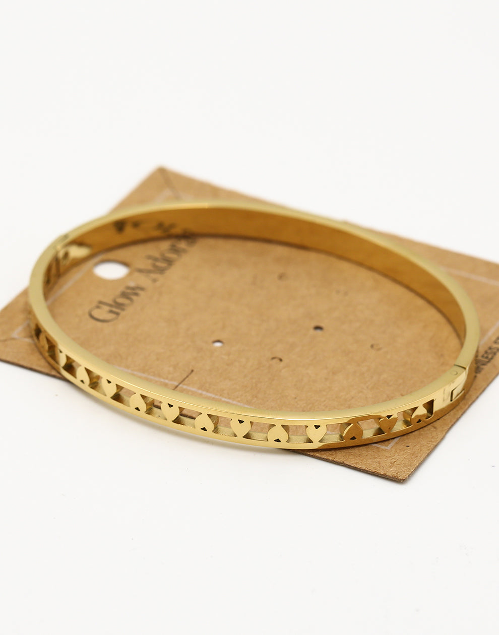 Armband bangle hartjes goudkleurig