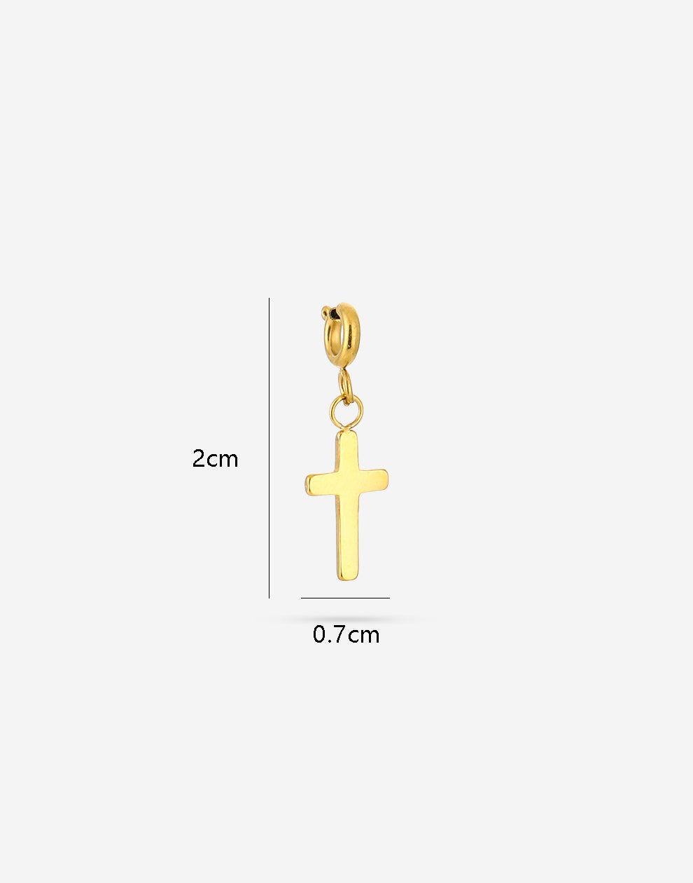 Loose gold-colored cross charm