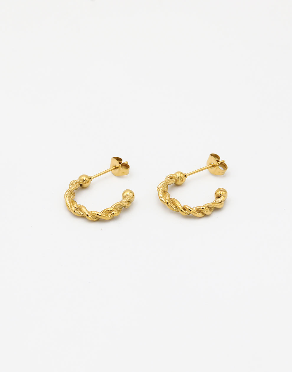 Oorringen open gedraaid met ribbels goudkleurig