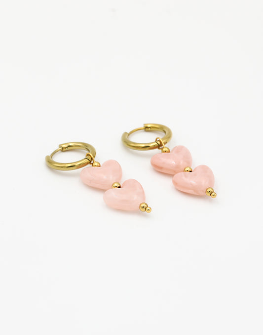 Hartjes kralenoorbellen roze