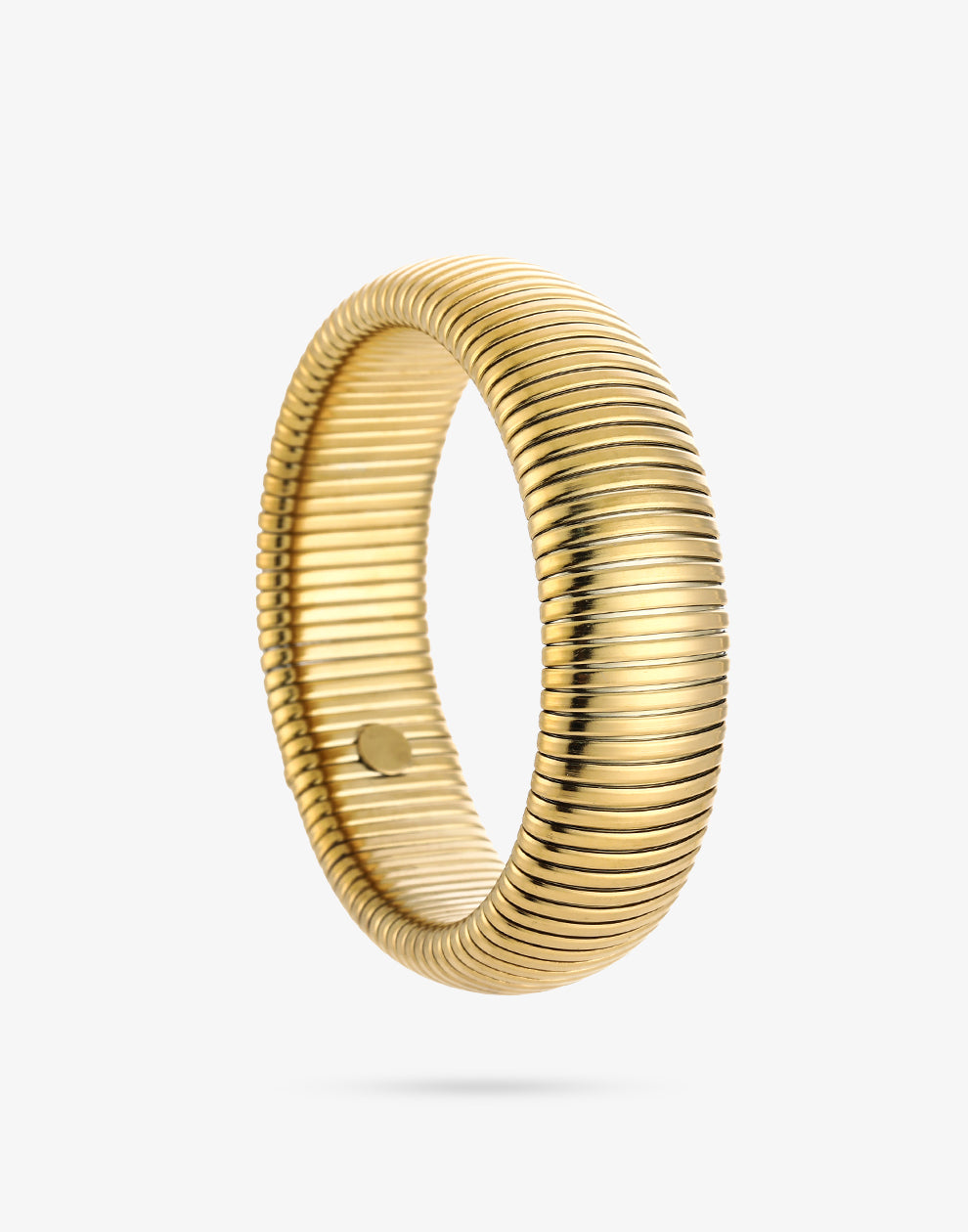Brede bangle met geribbeld patroon goudkleurig