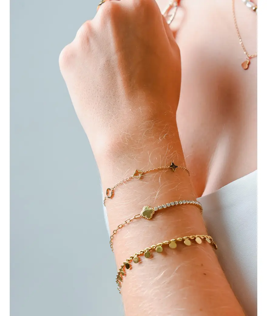 armband symbolen goud