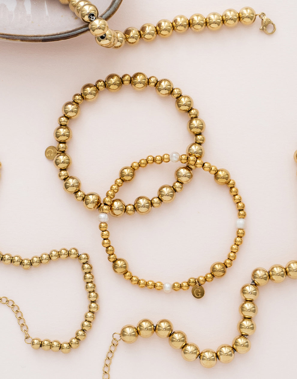 Armbanden goud