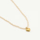 kralenketting hartje beige