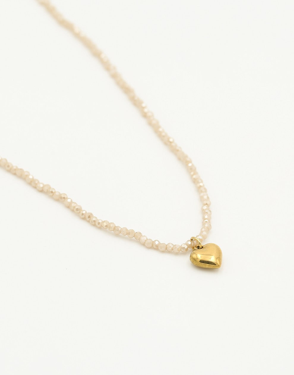 kralenketting hartje beige