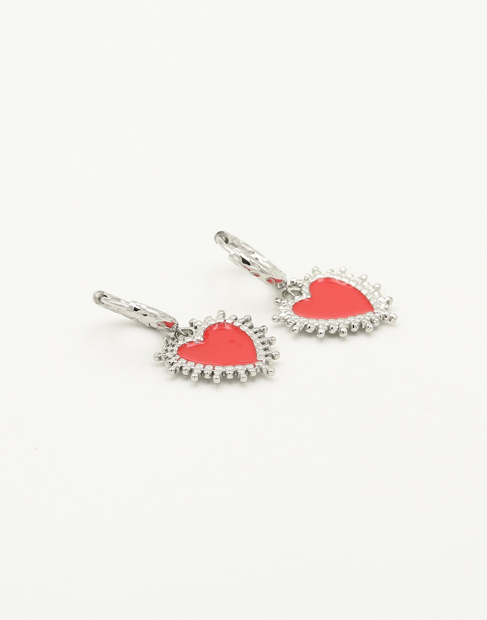 Silver-colored red heart earrings