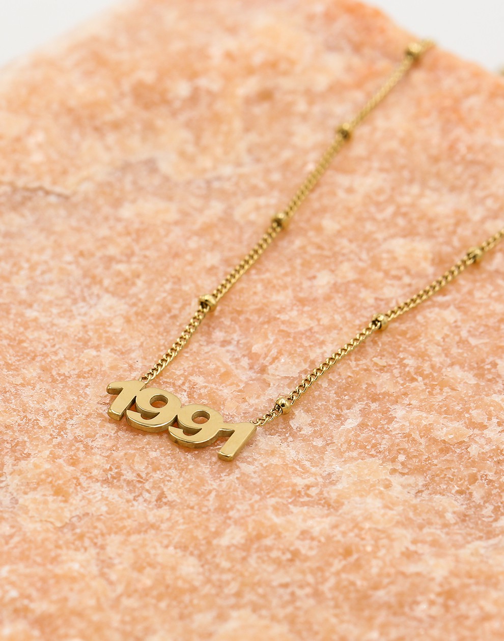 Ketting jaartal 1991 goudkleurig