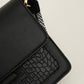 Crossbody tas met croco en hippe bagstrap zwart