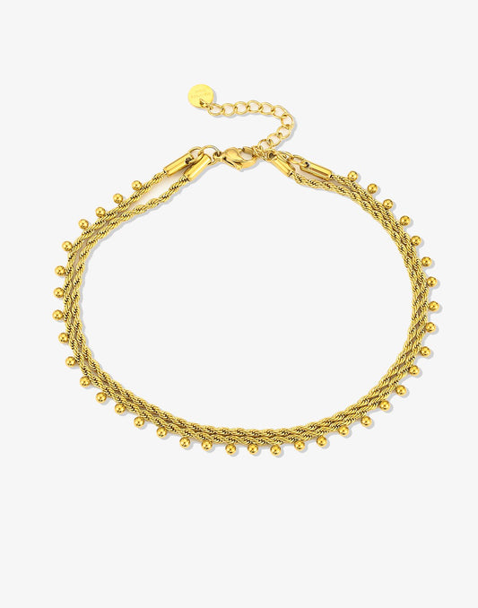 Enkelbandje dubbel chain gedraaid bolletjes goudkleurig