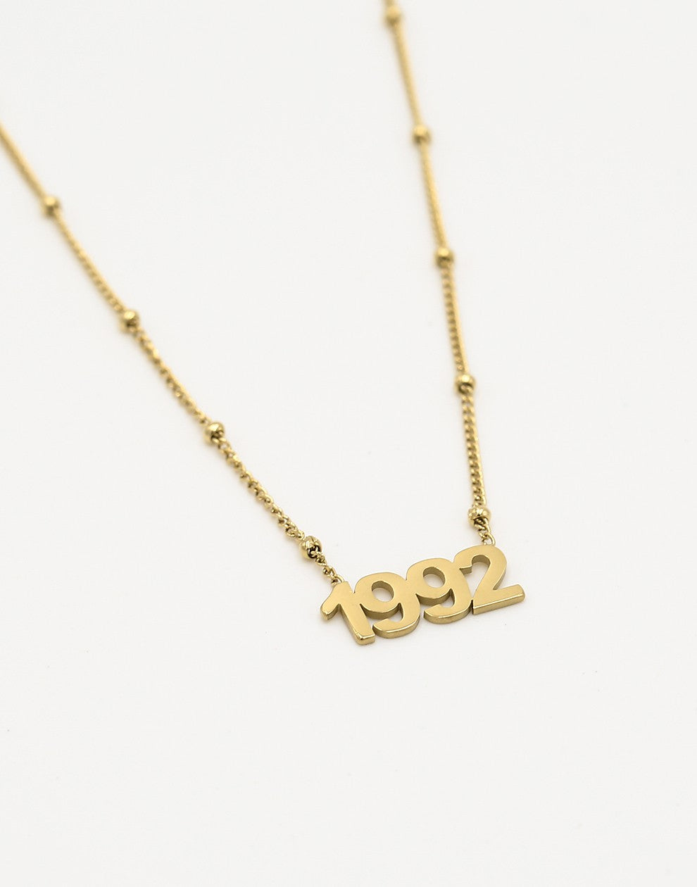 Ketting jaartal 1992 goudkleurig