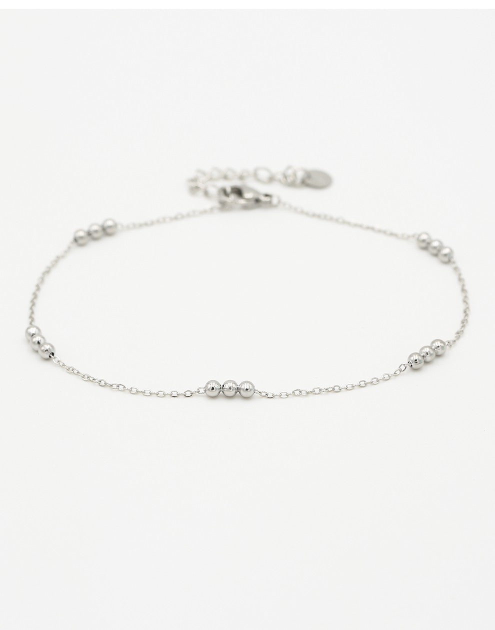 ankle bracelet with silver-colored beads