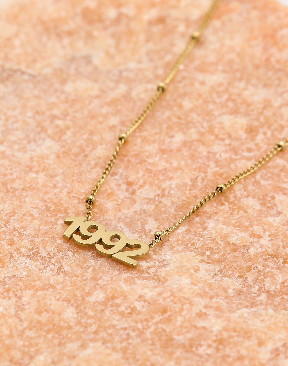 Ketting jaartal 1992 goudkleurig