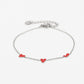 Armband speels hartjes rood zilverkleurig
