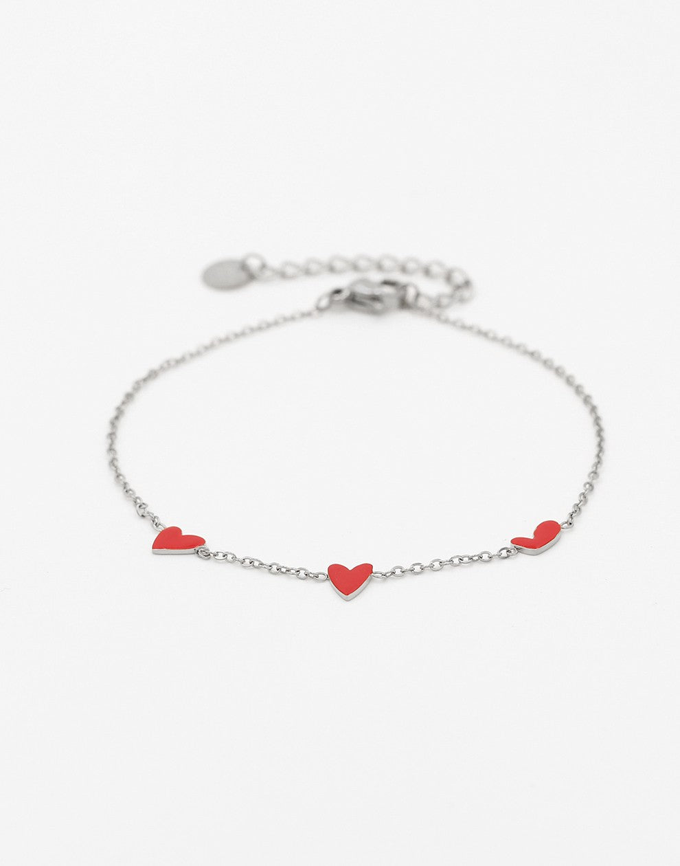 Armband speels hartjes rood zilverkleurig