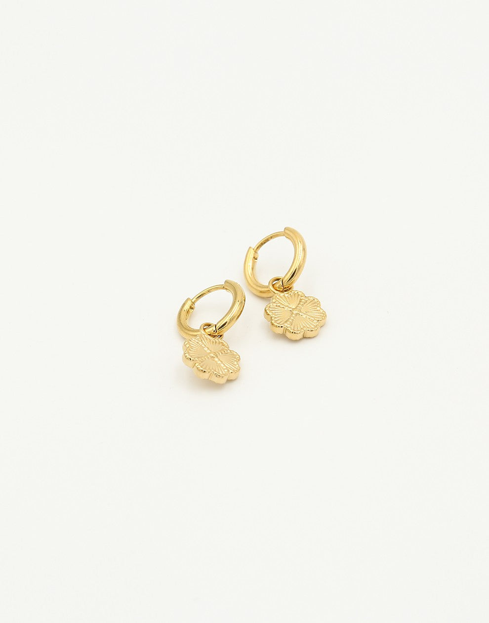 gold-colored clover love earrings