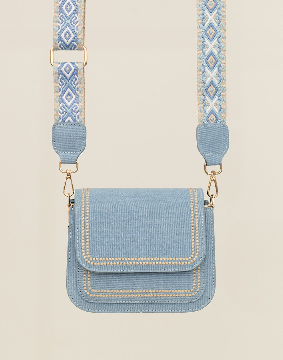 Trendy lichte jeans tas met bewerkte strap