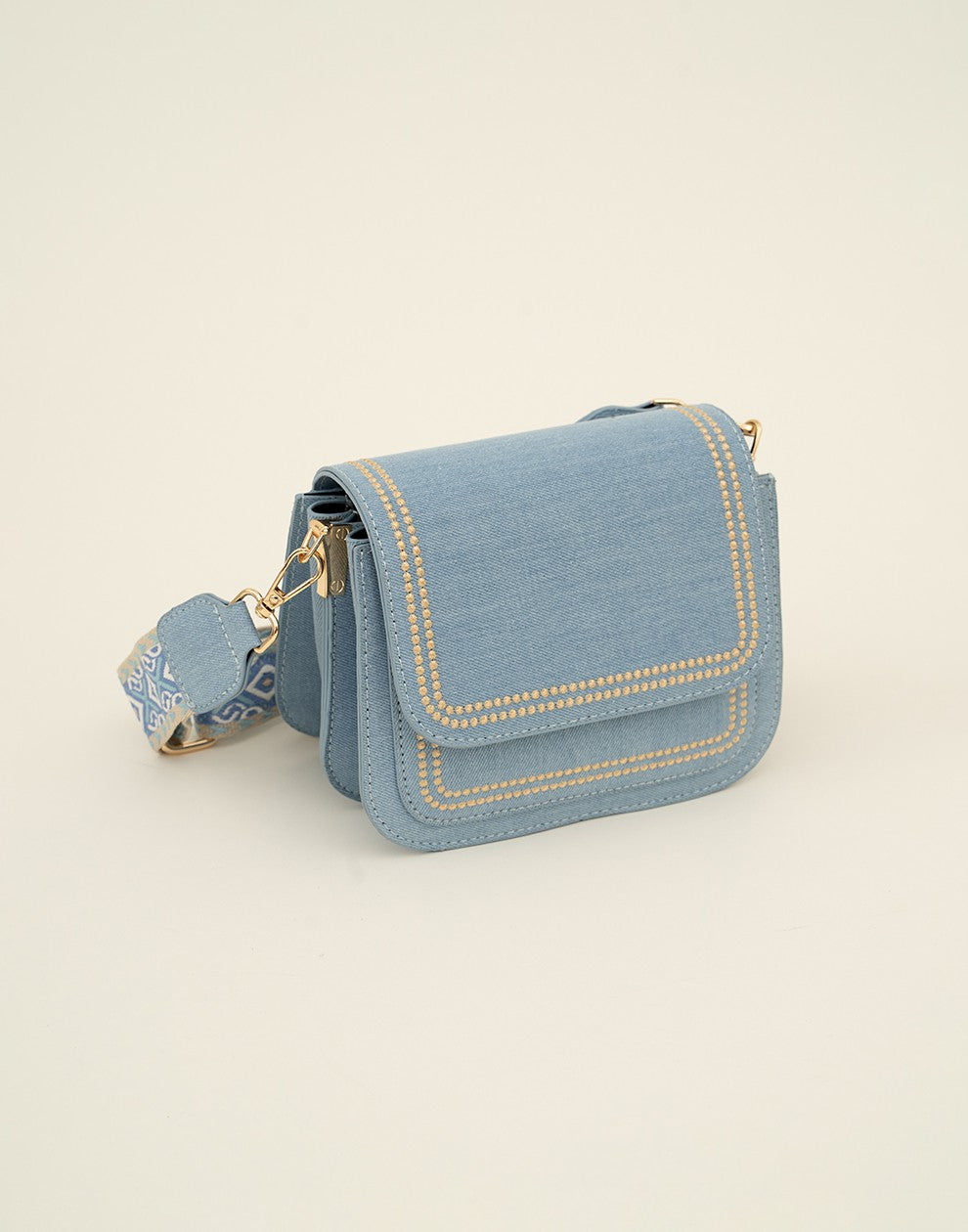 Trendy lichte jeans tas met bewerkte strap