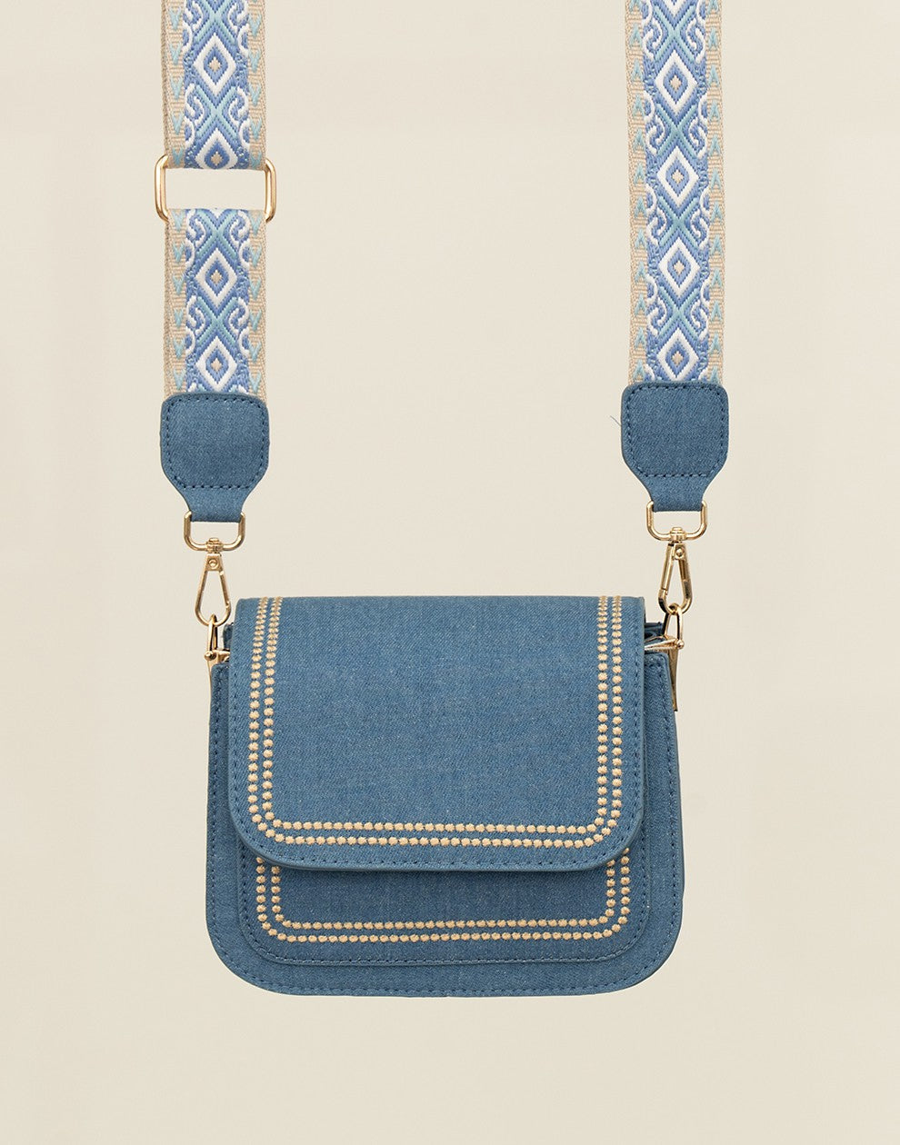 Trendy jeans tas met bewerkte strap