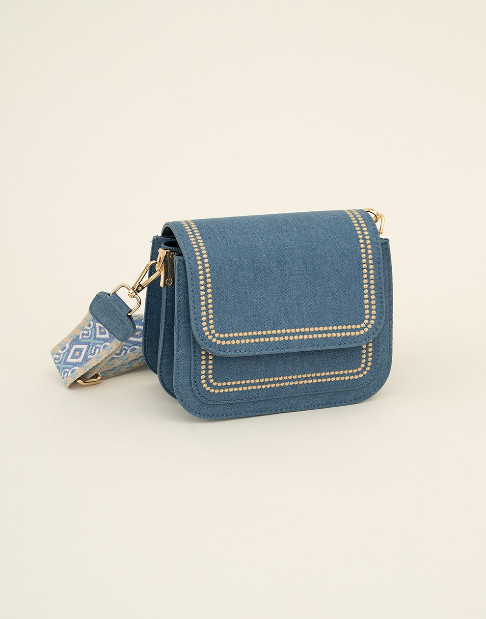 Trendy jeans tas met bewerkte strap