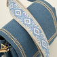 Trendy jeans tas met bewerkte strap