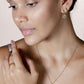 gold-colored clover love earrings