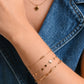 armband met klavertjes goudkleurig
