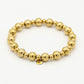 bollen armband goudkleurig