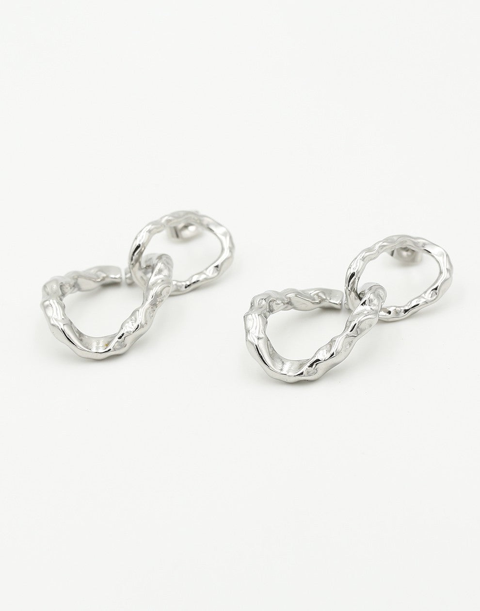 silver-colored link earrings 