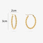 twisted hoops goudkleurig
