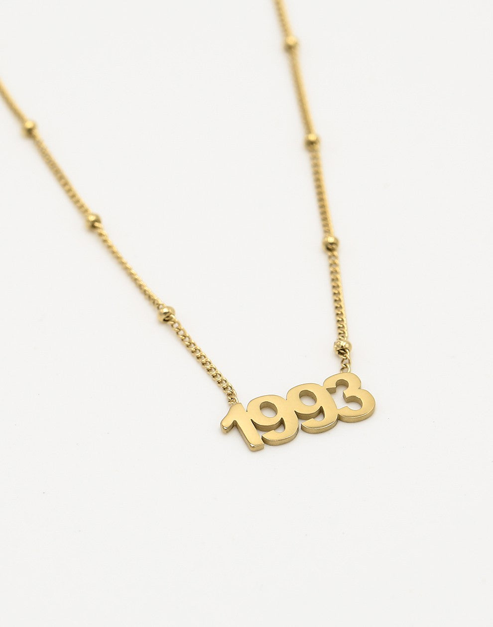 Ketting jaartal 1993 goudkleurig