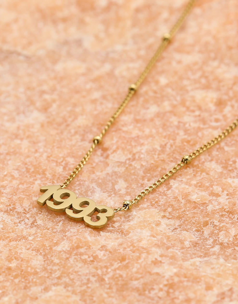 Ketting jaartal 1993 goudkleurig