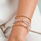 gedraaide schakelarmband goudkleurig 2.5mm
