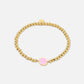 stretch armband smiley roze
