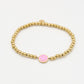 stretch armband smiley roze