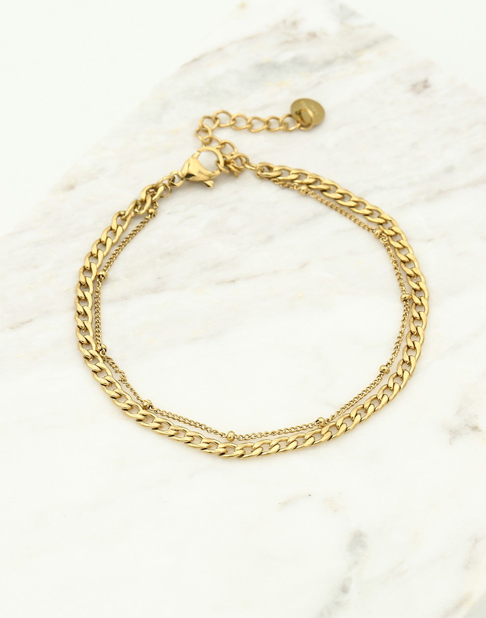 Dubbele schakelarmband goudkleurig