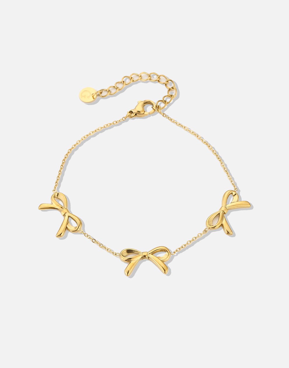 minimalistische armband met 3 strikjes goudkleurig