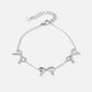 minimalist bracelet with 3 bows silver-colored