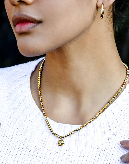 bolletjes ketting met hart goudkleurig