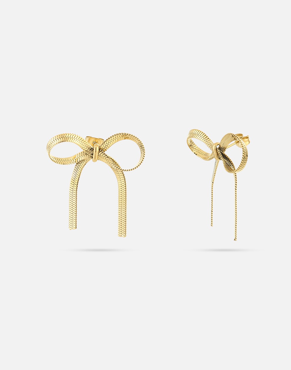 gold-colored bow earrings