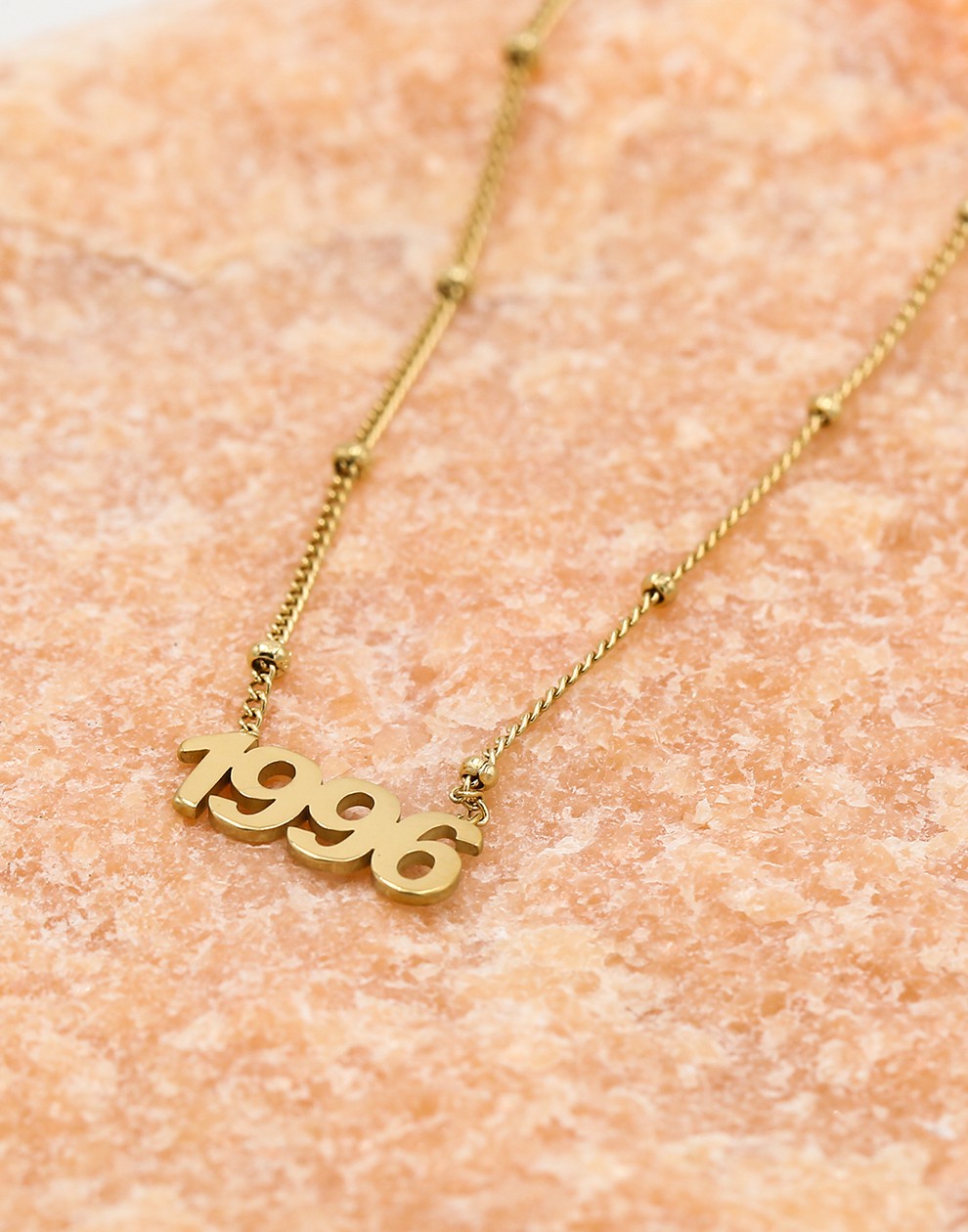 Ketting jaartal 1996 goudkleurig