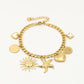 Charm bracelet links with different charms gold-colored