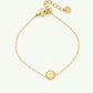 Bracelet coin with gold-colored heart